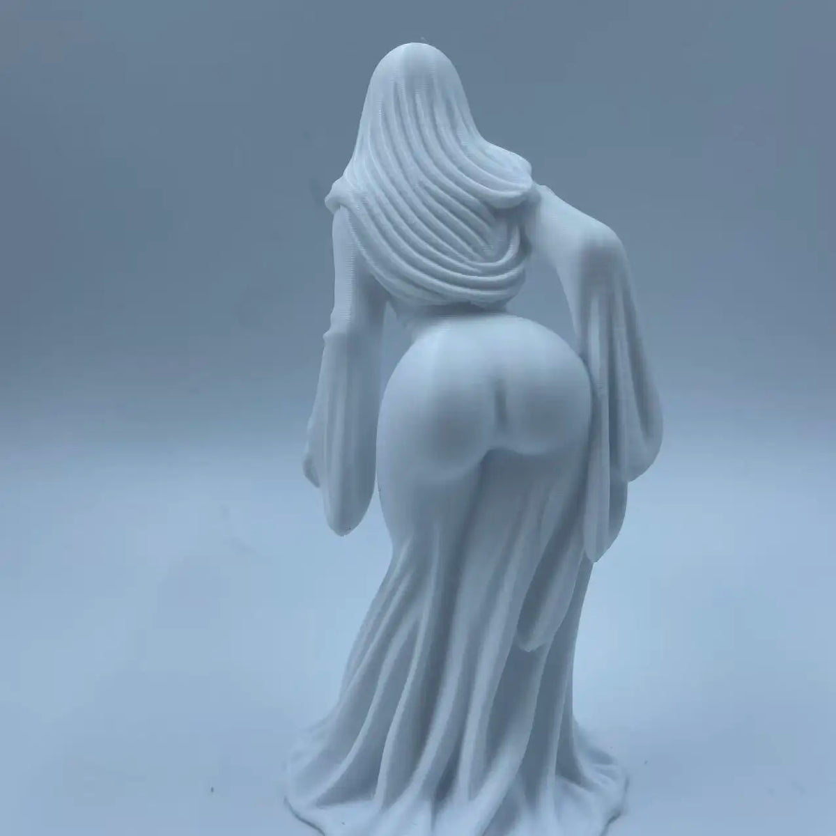 White ghost figurine dark style decor