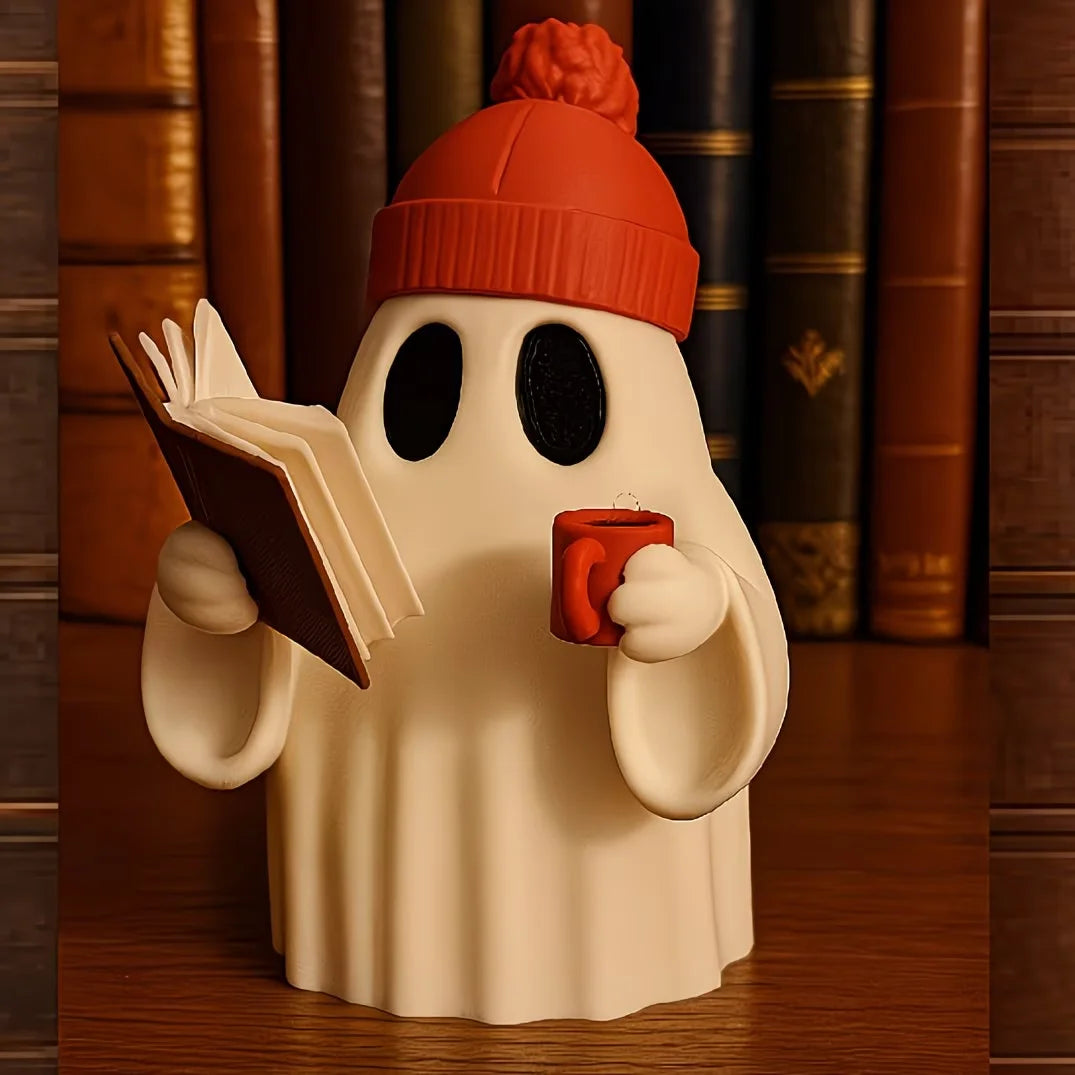 Cute ghost figurine reading a book