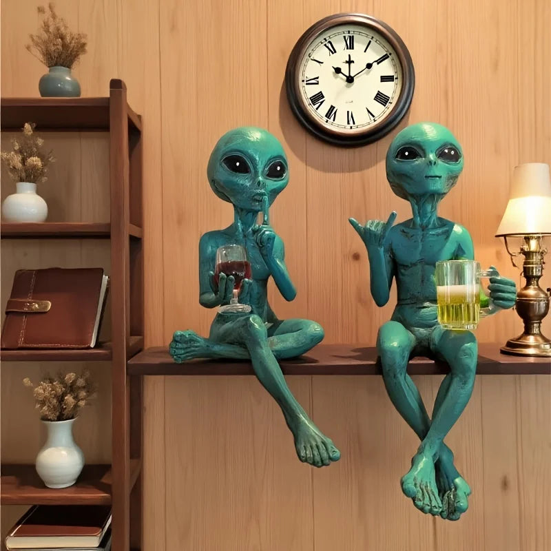 Alien figurine holding wine glass sci-fi decor