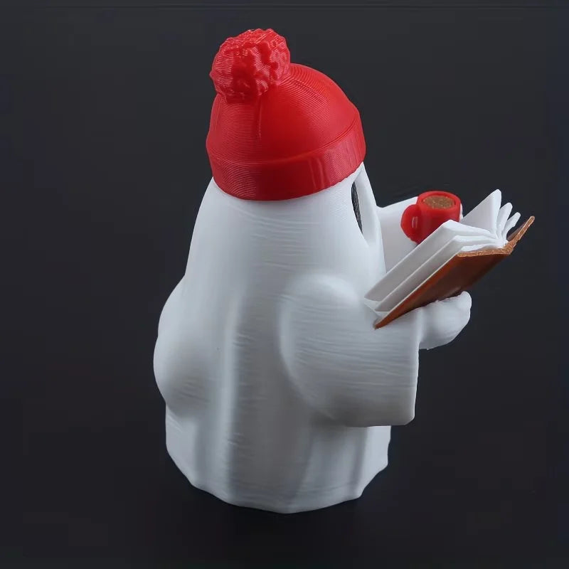 Cute ghost figurine reading a book