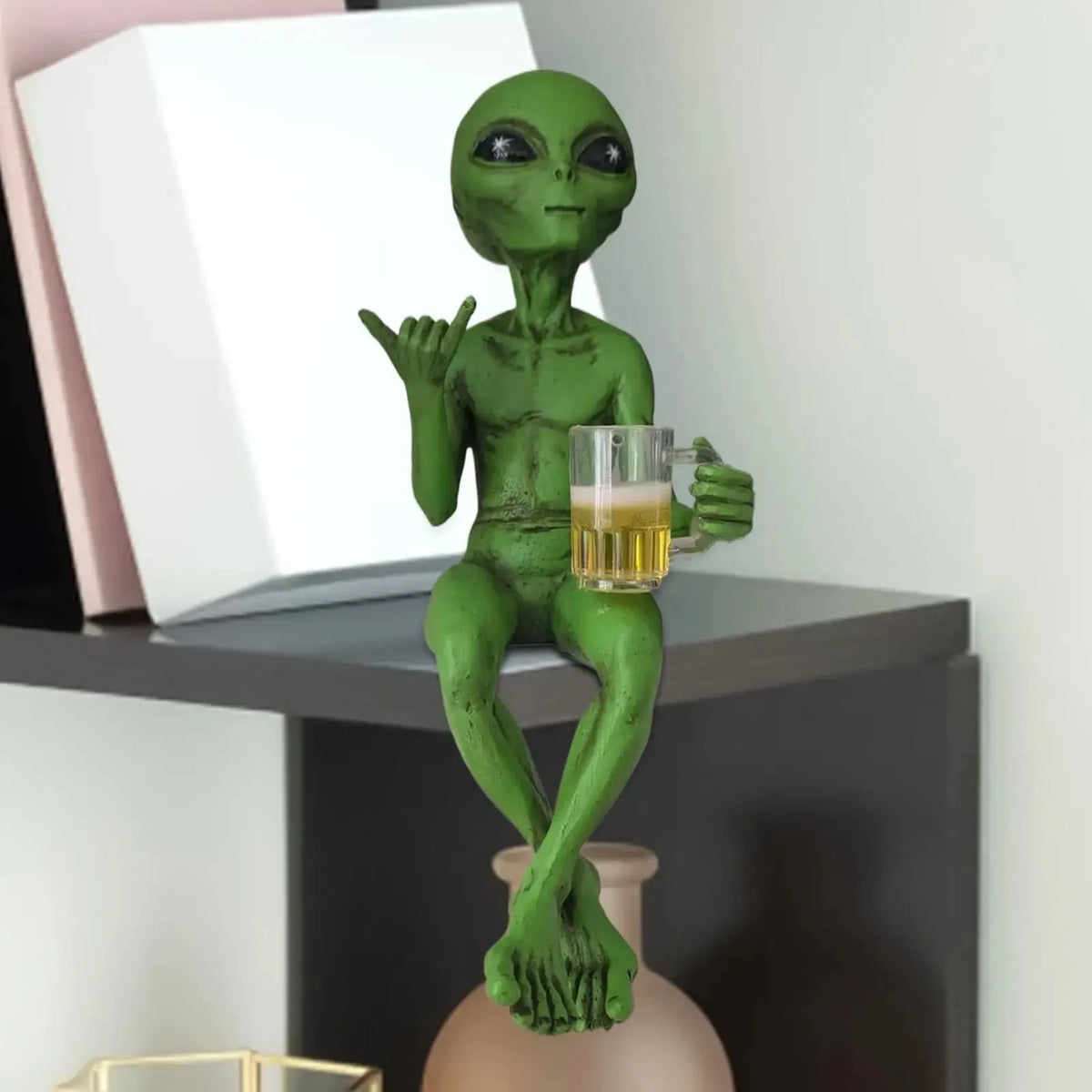 Alien figurine drinking beer resin statue