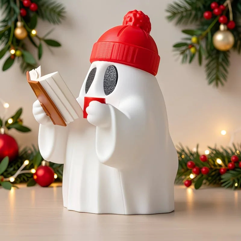 Cute ghost figurine reading a book